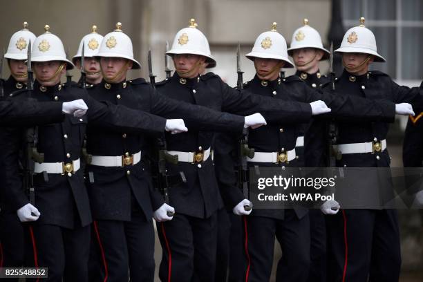 Royal Marines prepare for a parade attended by Britain's Prince Philip, in his role as Captain General, Royal Marines, makes his final individual...