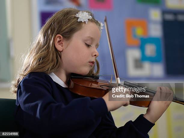 music lesson - musical instrument stock pictures, royalty-free photos & images