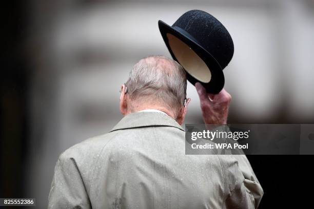 Prince Philip, Duke of Edinburgh raises his hat in his role as Captain General, Royal Marines, makes his final individual public engagement as he...