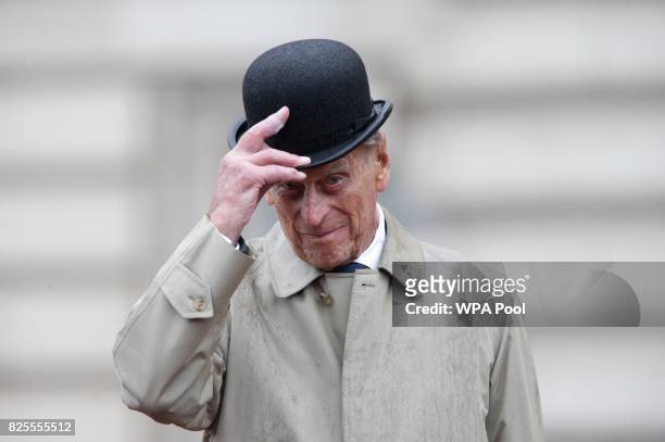 Prince Philip, Duke of Edinburgh raises his hat in his role as Captain General, Royal Marines, makes his final individual public engagement as he...