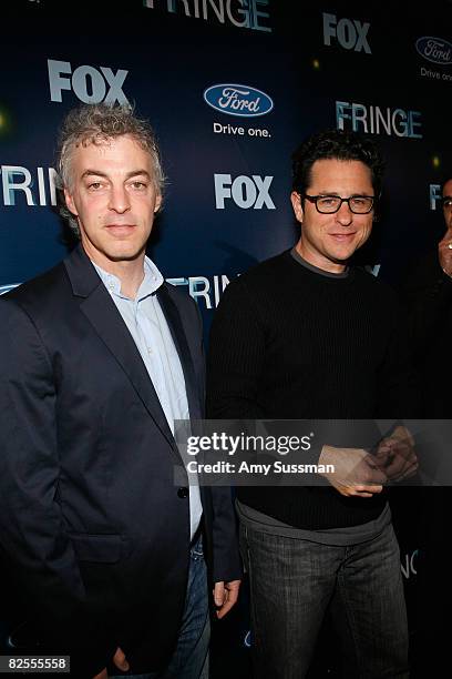 Executive Producer Jeff Pinkner and Co-Creator and Executive Producer J.J. Abrams attend the "Fringe" New York Premiere Party at The Xchance on...