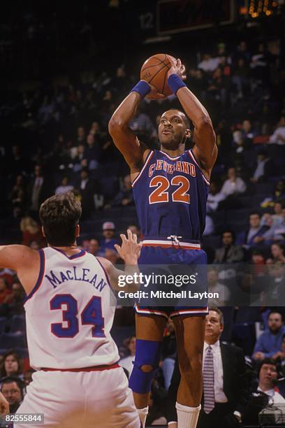 Larry Nance of the Cleveland Cavaliers takes a jump shot during a NBA basketball game against the Washington Bullets at USAir Arena on February 23,...