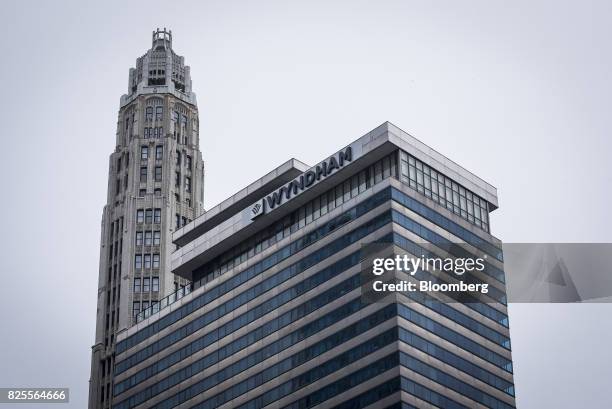 Signage is displayed on the top of a Wyndham Grand Chicago Riverfront Hotel in downtown Chicago, Illinois, U.S., on Thursday, July 27, 2017. Wyndham...