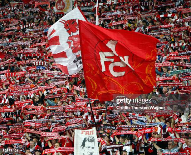 Fans of Kaiserslautern celebrate after the Second Bundesliga match between 1.FC Kaiserslautern and 1.FC Nuernberg at the Fritz-Walter-Stadium in...