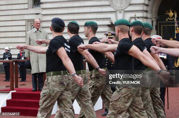 Britain's Prince Philip, Duke of Edinburgh, in his role as Captain General, Royal Marines, attends a Parade to mark the finale of the 1664 Global...
