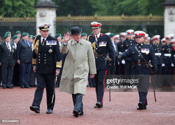 Britain's Prince Philip, Duke of Edinburgh, in his role as Captain General, Royal Marines, attends a Parade to mark the finale of the 1664 Global...