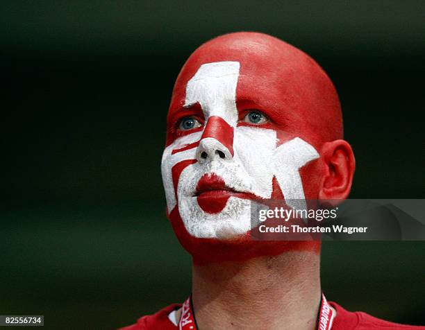 Fan of Kaiserslautern with a face painting is seen during the Second Bundesliga match between 1.FC Kaiserslautern and 1.FC Nuernberg at the...