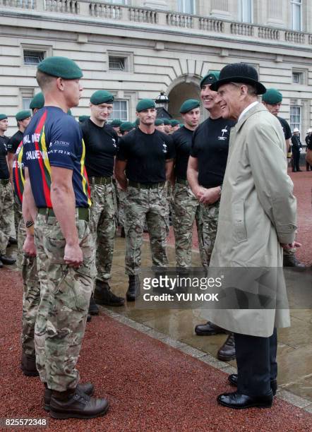 Britain's Prince Philip, Duke of Edinburgh, in his role as Captain General, Royal Marines, attends a Parade to mark the finale of the 1664 Global...
