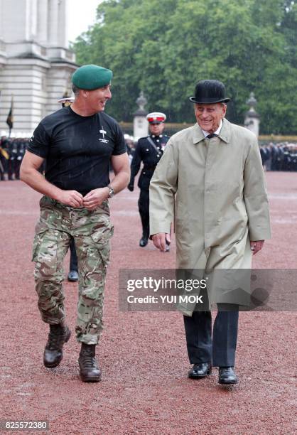 Britain's Prince Philip, Duke of Edinburgh, in his role as Captain General, Royal Marines, attends a Parade to mark the finale of the 1664 Global...