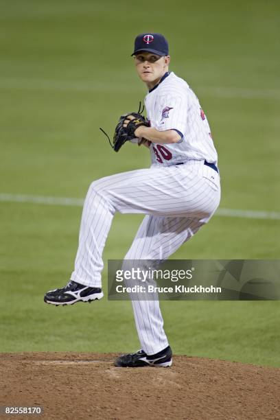 Scott Baker of the Minnesota Twins pitches against the Seattle Mariners at the Humphrey Metrodome in Minneapolis, Minnesota on August 16, 2008. The...