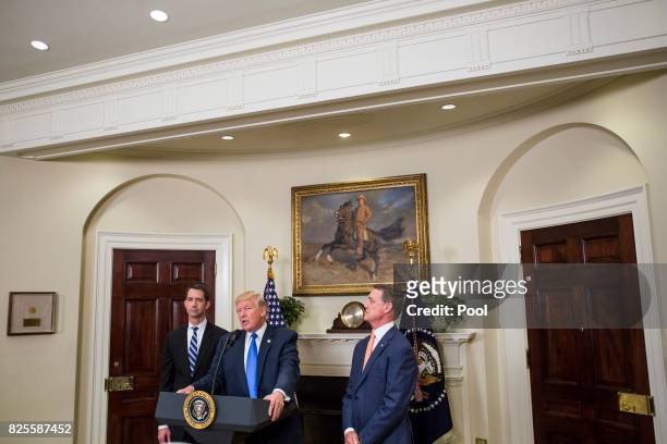 President Donald Trump makes an announcement on the introduction of the Reforming American Immigration for a Strong Economy Act with Sen. Tom Cotton...