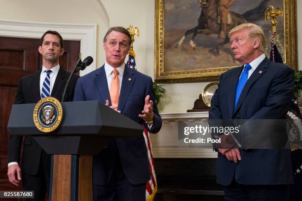 Sen. David Perdue makes an announcement on the introduction of the Reforming American Immigration for a Strong Economy Act in the Roosevelt Room at...