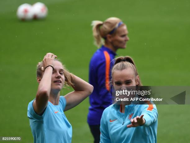 Netherlands' Vivianne Miedema and Jill Roord attend a training session at FC Twente stadium in Enschede, on August 2, 2017 on the eve of the UEFA...