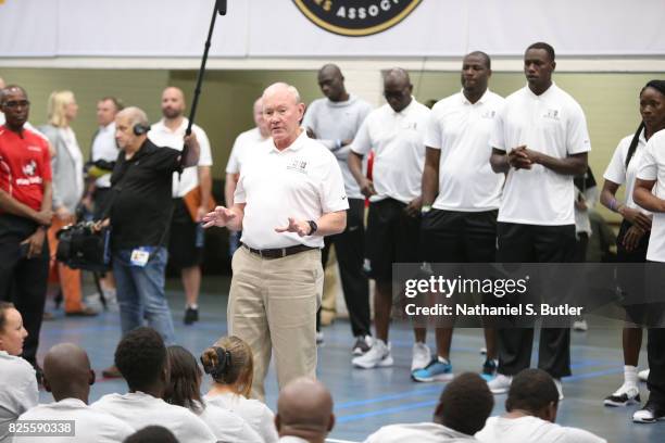 General Martin Dempsey speaks during the Jr. NBA Special Olympics clinic as part of Basketball Without Borders Africa at the American International...