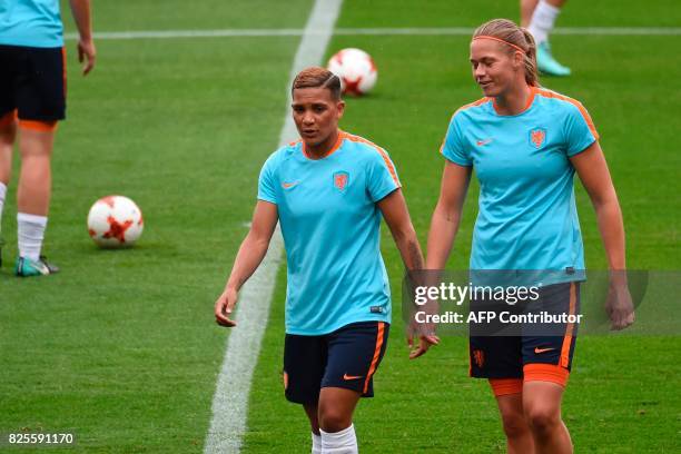 Netherlands' forward Shanice van de Sanden and defender Stefanie van der Gragt attend a training session at FC Twente Stadiun in Enschede, on August...