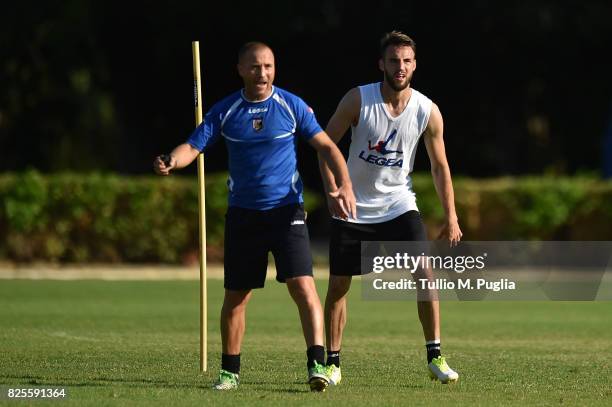 Assistant coach Carlo Marchetto and Przemyslaw Szyminski take part in a training session after the presentation of Giuseppe Bellusci as new player of...