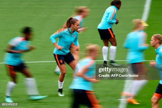 Netherlands' Lieke Martens and players attend a training session at FC Twente stadium in Enschede, on August 2, 2017 on the eve of the UEFA Women's...