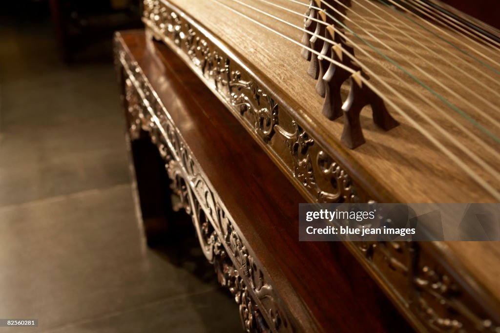 Gu Jing Instrument Close Up Of A Traditional Chinese Musical Instrument Called The Gu Zhen ...