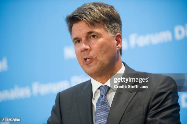 Harald Krueger, CEO of German car maker BMW attends a news conference after the Diesel Conference on August 2, 2017 in Berlin, Germany. Germany's car...