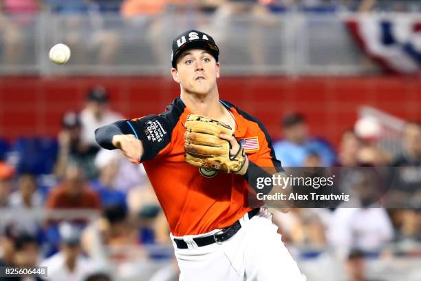 Brian Anderson of Team USA throws to first base for the out during the SirusXM All-Star Futures Game at Marlins Park on Sunday, July 9, 2017 in...