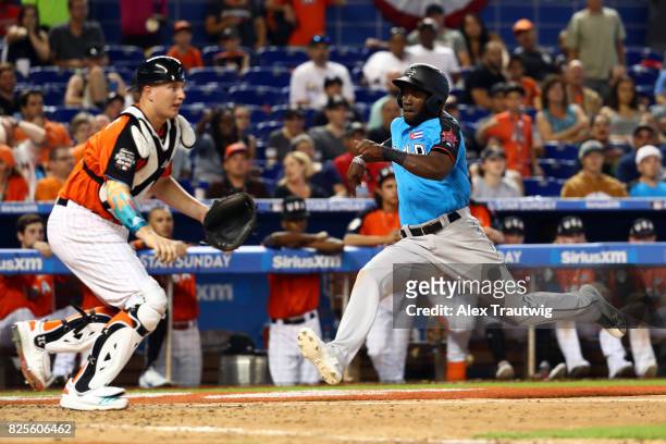 Yordan Alvarez of the World Team scores a run during the SirusXM All-Star Futures Game at Marlins Park on Sunday, July 9, 2017 in Miami, Florida.