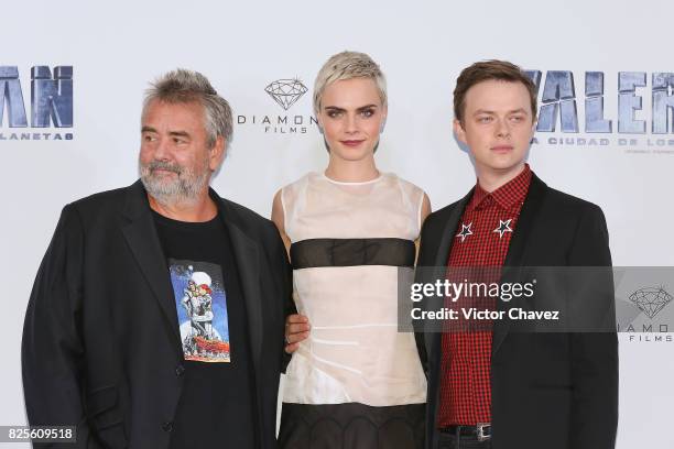 Film director Luc Besson, actress Cara Delevingne and actor Dane DeHaan attend a photocall to promote their new film "Valerian And The City Of A...