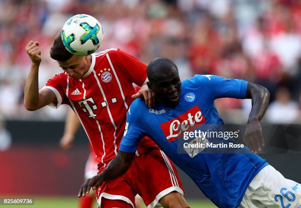 Kalidou Koulibaly of Napoloi and Mario Crnicki of Muenchen battle for the ball during the Audi Cup 2017 match between SSC Napoli and FC Bayern...