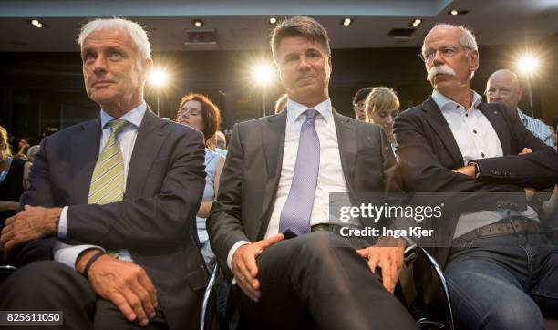 Matthias Mueller , CEO of German car maker Volkswagen, Harald Krueger, CEO of German car maker BMW and Dieter Zetsche, chairman of German car maker...