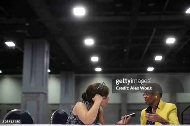 Rep. Eleanor Holmes Norton participates in an interview with Washington Times reporter Emma Ayers during a job fair at the Walter E. Washington...