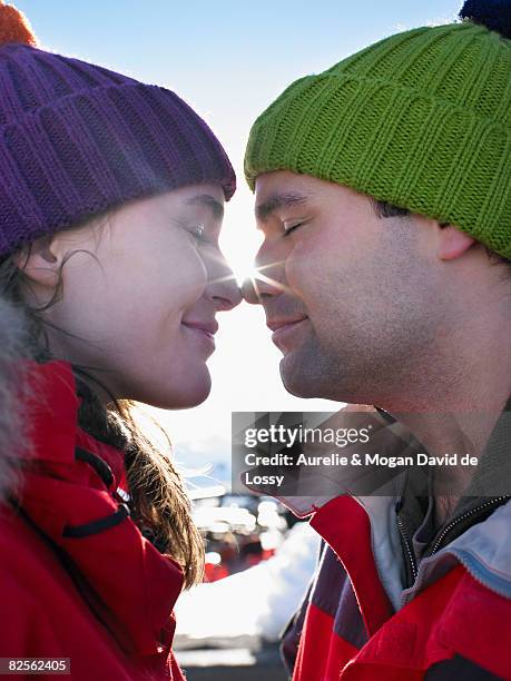 eskimo kiss - ski closeup stock-fotos und bilder