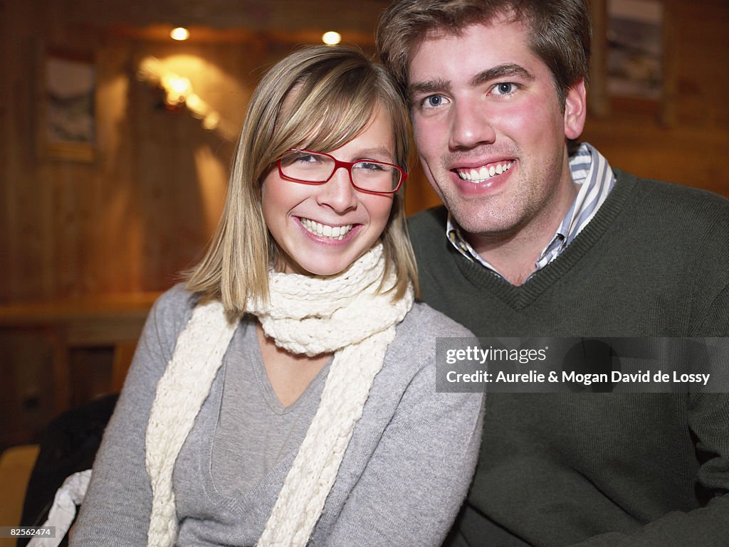 Smiling couple in restaurant