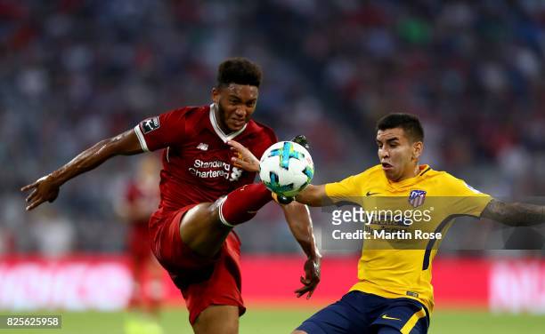 Joe Gomez of Liverpool and Correa of Atletico Madrid battle for the ball during the Audi Cup 2017 match between Liverpool FC and Atletico Madrid at...
