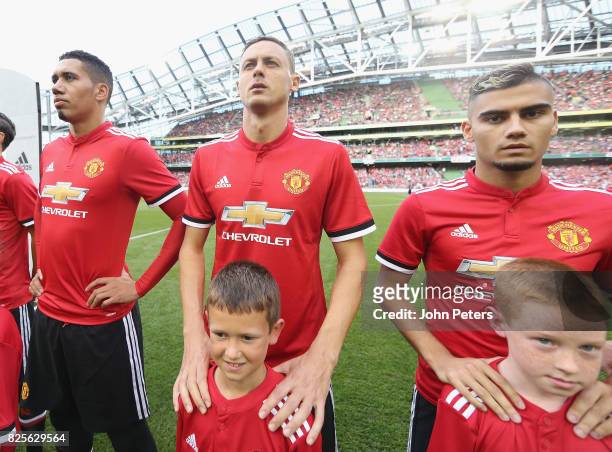 Nemanja Matic of Manchester United lines up with the United team ahead of the International Champions Cup pre-season friendly match between...