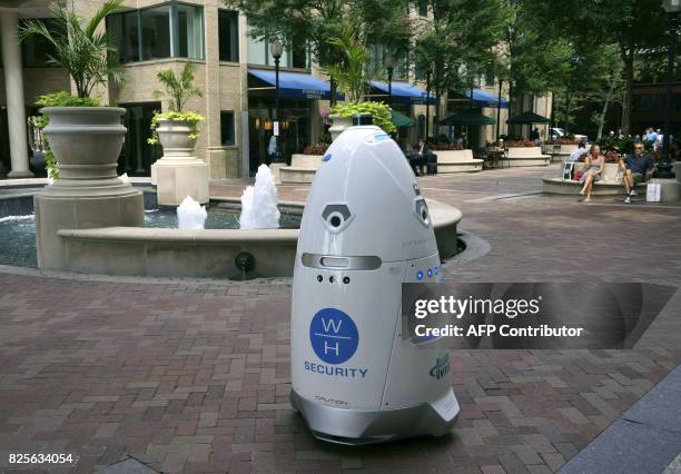Five-foot tall outdoor K5 security robot patrols the grounds of the Washington Harbour retail-residential center in the Georgetown district of...