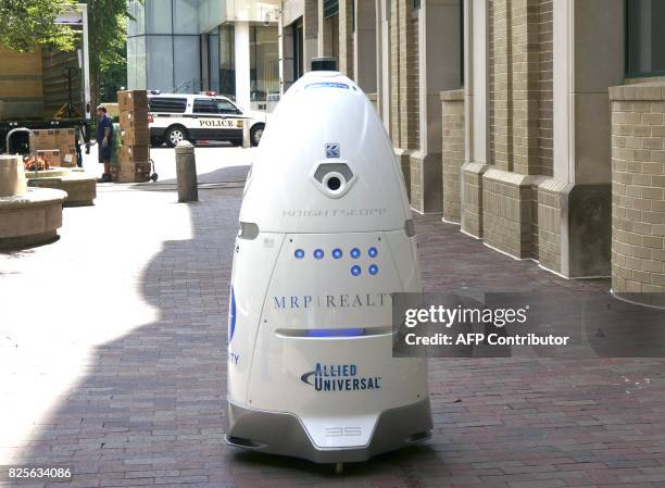 Five-foot tall outdoor K5 security robot patrols the grounds of the Washington Harbour retail-residential center in the Georgetown district of...