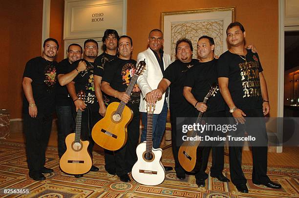 Designer Christian Audigier with muscians Chico and the Gypsies at Christian Audigier presents "When I Move You Move" The Tradeshow Day 2 on August...