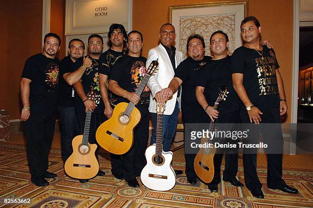Designer Christian Audigier with muscians Chico and the Gypsies at Christian Audigier presents "When I Move You Move" The Tradeshow Day 2 on August...
