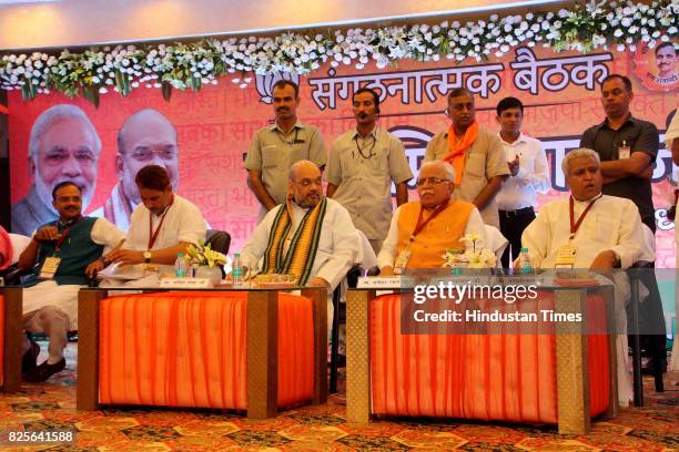 National President Amit Shah, Haryana Chief Minister Manohar Lal Khattar, In-charge of Party Affairs in Haryana Dr. Anil Jain and BJP State President...