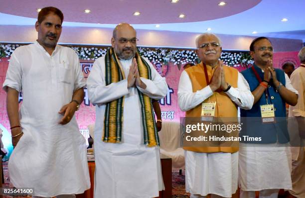 National President Amit Shah, Haryana Chief Minister Manohar Lal Khattar, In-charge of Party Affairs in Haryana Dr. Anil Jain and BJP State President...