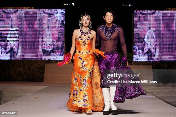 Chae -Young and Park Si-Hoo showcase designs by Korean couture designer Andre Kim at the opening catwalk show on the first day of Bali Fashion Week...