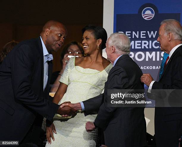 Craig Robinson and his sister Michelle Obama, wife of presumptive Democratic nominee U.S. Sen. Barack Obama , greet Former U.S. President Jimmy...