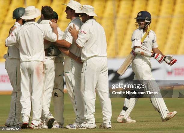 Cricket - India vs South Africa Second Test Match at Ahmedabad - India's Sourav Ganguly looks back at South Africa bowler Dale Steyn celebrates his...