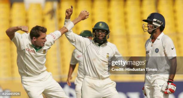 Cricket - India vs South Africa Second Test Match at Ahmedabad - South Africa bowler Dale Steyn celebrates the wicket of India's Sourav Ganguly with...