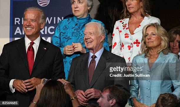 Sen. Joe Biden, former president Jimmy Carter, and Jill Biden watch the proceedings on day two of the Democratic National Convention at the Pepsi...