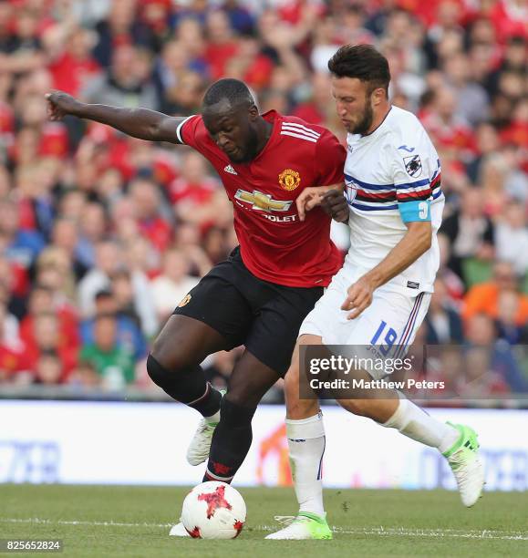 Romelu Lukaku of Manchester United in action with Vasco Regini of Sampdoria during the International Champions Cup pre-season friendly match between...