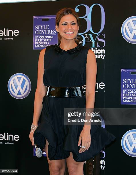 Actress Eva Mendes is interviewed by Richard Wilkins during a press conference to launch "30 Days of Fashion & Beauty" at the Park Hyatt Hotel on...