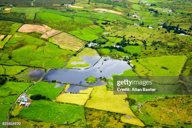 aerial view of lake in county clare in ireland - global warming stock pictures, royalty-free photos & images