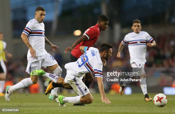 Marcus Rashford of Manchester United in action with Vasco Regini of Sampdoria during the International Champions Cup pre-season friendly match...