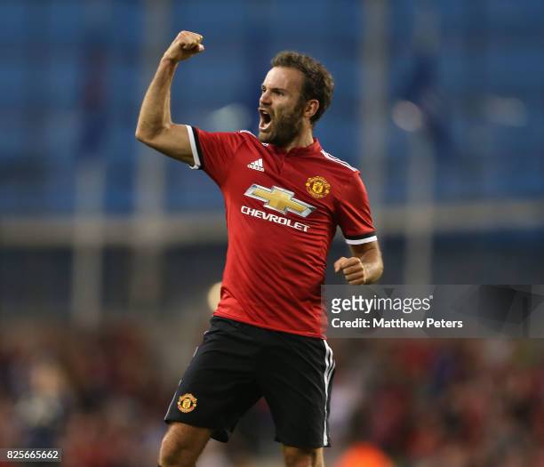 Juan Mata of Manchester United celebrates scoring their second goal during the International Champions Cup pre-season friendly match between...