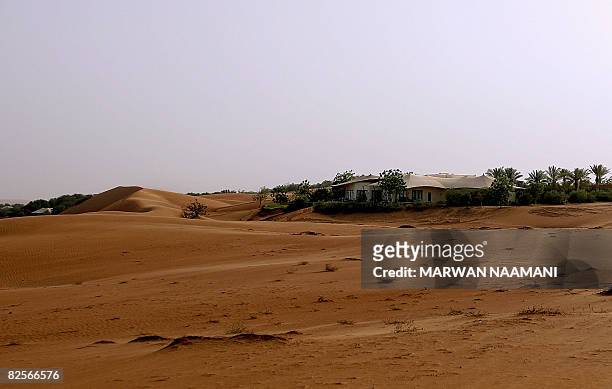 General view shows the lodges of al-Maha nature reserve and resort, some 100 kms south of Dubai, on June 30, 2008. Al-Maha is based on a blend of...